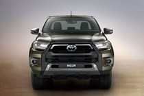 2020 Toyota Hilux facelift - dead-on front view, Titan Bronze metallic