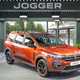 Orange 22-plate Dacia Jogger static shot in a showroom