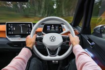 VW electric cars - ID.3, interior, with hands on steering wheel