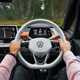 VW electric cars - ID.3, interior, with hands on steering wheel