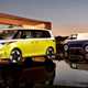 VW electric cars - ID. Buzz (yellow and white) and ID. Buzz Cargo (blue and white)