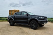 Ford Ranger Raptor long-term test review, 2021, front view with straw bales