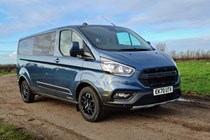 Ford Transit Custom Trail - how does it compare with the Ranger Raptor? Front view, blue