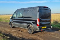 Ford Transit Trail - how does it compare with the Ranger Raptor? Rear view, DCiV, black