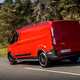 Ford Transit Custom Trail review, 2020, red, rear view, driving