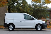 Volkswagen Caddy Cargo, 2020, side view, driving, white