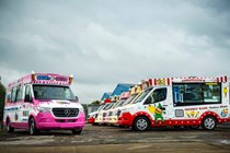 Whitby Morrison Mercedes-Benz Sprinter ice cream vans - row of finished vans, moody sky