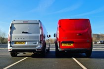 Best hybrid van UK 2021 - Ford Transit Custom PHEV vs LEVC VN5 comparison test, 2020 - dead-on rear view, silver, red