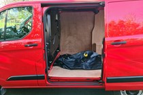 Best hybrid van UK 2021 - Ford Transit Custom PHEV vs LEVC VN5 comparison test, 2020 - PHEV load area, side door, boot bag