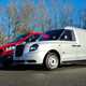 Best hybrid vans UK 2021 - Ford Transit Custom PHEV vs LEVC VN5 comparison test - side-by-side, front, silver, red