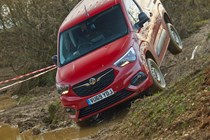 Vauxhall Combo Cargo 4x4 review, red, front view, driving down muddy slope