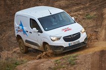 Vauxhall Combo Cargo 4x4 review - white, front view, slashing through mud