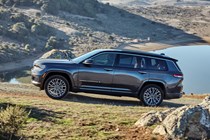 Grey 2021 Jeep Grand Cherokee L side elevation driving