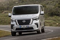 2021 Nissan NV300 Combi - front view driving round corner, silver