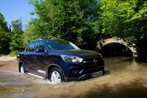 Best pickup trucks UK: SsangYong Musso, Rebel, wading through river