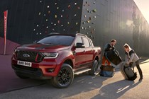 Ford Ranger Stormtrak, 2021, Rapid Red, front view with people and luggage