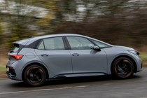The Cupra Born on the road in a driving shot