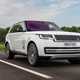 Best luxury SUVs - Range Rover, white, front view, driving on road
