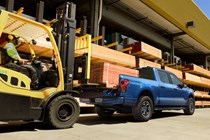 Ford F-150 Lightning electric pickup truck, payload being loaded