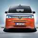 VW Multivan - 2021 Caravelle replacement, dead-on front view, silver and orange