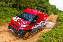 Iveco Daily 4x4 All-Road panel van, red, front view, driving off-road