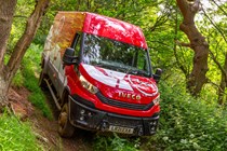Iveco Daily 4x4 All-Road panel van, red, front view, forest