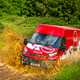 Iveco Daily 4x4 review - All-Road, red, driving through water-splash off-road