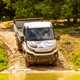 Iveco Daily 4x4 Off-Road chassis cab, white, front view, approaching deep water down slope