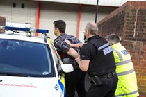 Van security guide - criminal being arrested