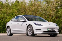 Best electric family cars: Tesla Model 3 front three quarter static, white car