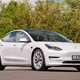 Best electric family cars: Tesla Model 3 front three quarter static, white car