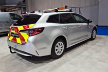 Toyota Corolla Commercial Hybrid Electric van at the 2021 CV Show, rear view, silver, with Chapter 8 markings