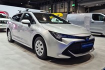 Toyota Corolla Commercial Hybrid Electric van at the 2021 CV Show, front view, silver