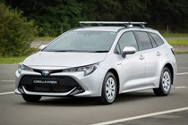 Toyota Corolla Commercial Hybrid van, front view, silver, high