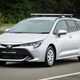 Toyota Corolla Commercial Hybrid van, front view, silver, high