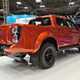 Isuzu D-Max Arctic Trucks AT35 at the 2021 CV Show, rear side view, orange, prototype