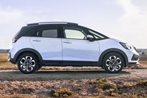Best small hybrid cars 2024: Honda Jazz side view static, grey paint