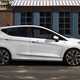 Best small hybrid cars 2024: Ford Fiesta side view static, white paint