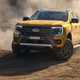 New Ford Ranger - driving off-road, front view, yellow, Wildtrak
