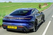 Porsche Taycan - electric car range - blue car, following shot