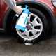Cleaning a wheel with a pump sprayer