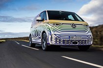 Volkswagen ID. Buzz electric van, front view, driving, low, blue sky