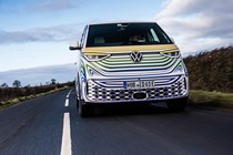 Volkswagen ID. Buzz electric van, dead-on front view, driving