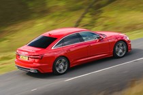 Audi A6 Saloon (2018-) UK rhd model in red, side-on driving