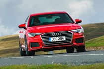 Audi A6 Saloon (2018-) UK rhd model in red, front view - driving
