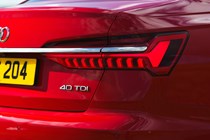 Audi A6 Saloon (2018-) UK rhd model in red - exterior detail - rear light cluster