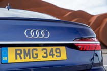 Audi S6 Saloon (2018-) UK rhd model in blue - exterior detail - boot,logo and rear lamp cluster