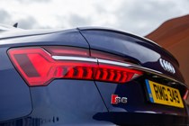 Audi S6 Saloon (2018-) UK rhd model in blue - exterior detail - rear lamp cluster and 'S6' badge