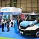 Iveco eDaily chassis cab on CV Show stand, surrounded by show-goers