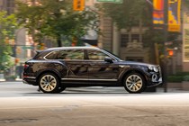 Bentley Bentayga Extended Wheelbase review - rear view, purple, driving